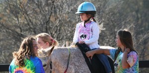 Abby riding a horse